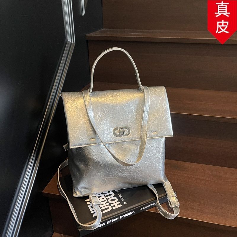 高级皮质洋气双肩包轻奢气质书包学生大容量新款银色女真背包包包
