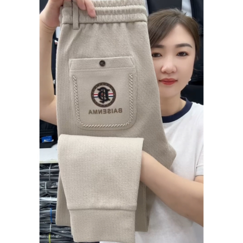 秋季新款休闲裤时尚百搭松紧腰弹力运动卫裤纯色潮牌显瘦小脚裤男