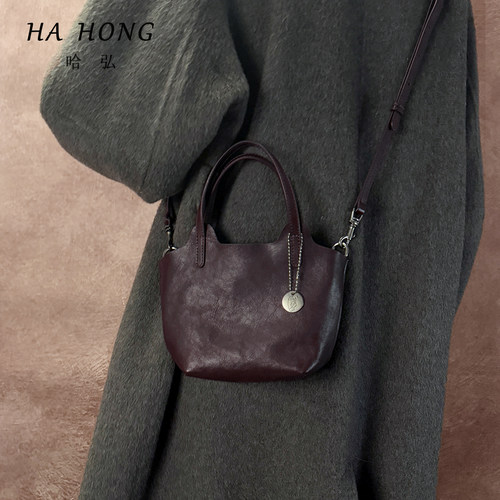 哈弘2025春夏新款植鞣头层牛皮菜篮包单肩斜挎手提小包百搭通勤风