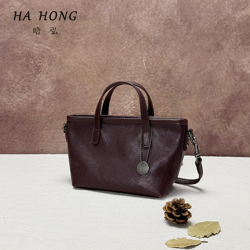 哈弘新款小方包头层牛皮简约百搭