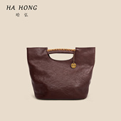 哈弘植鞣头层牛皮可单肩可斜挎包水桶包大容量手提包简约复古大气