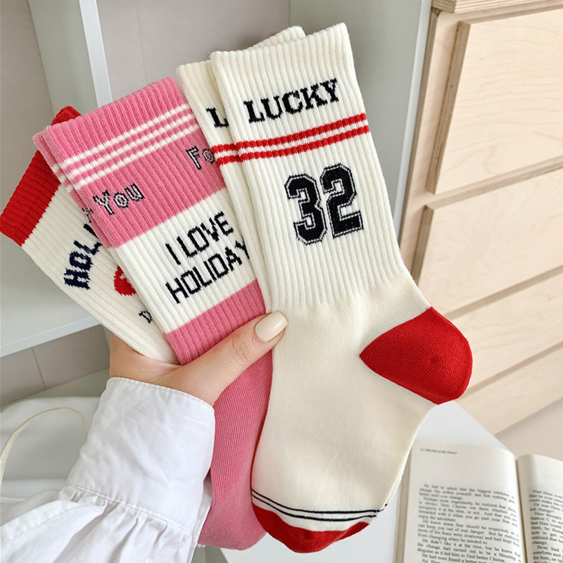 粉色少女学院风字母中筒袜子女