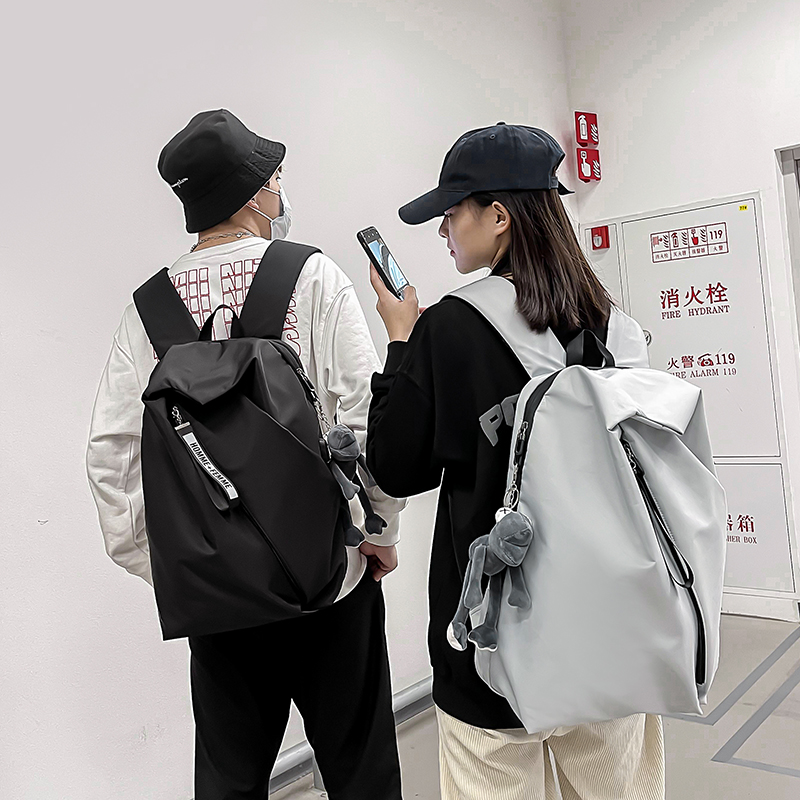 新款大容量双肩包男大学生情侣书包女折叠电脑旅行包时尚背包