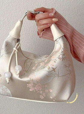 国风丝绸刺绣旗袍包包女2026新款夏季斜挎饺子包古风新中式手提包