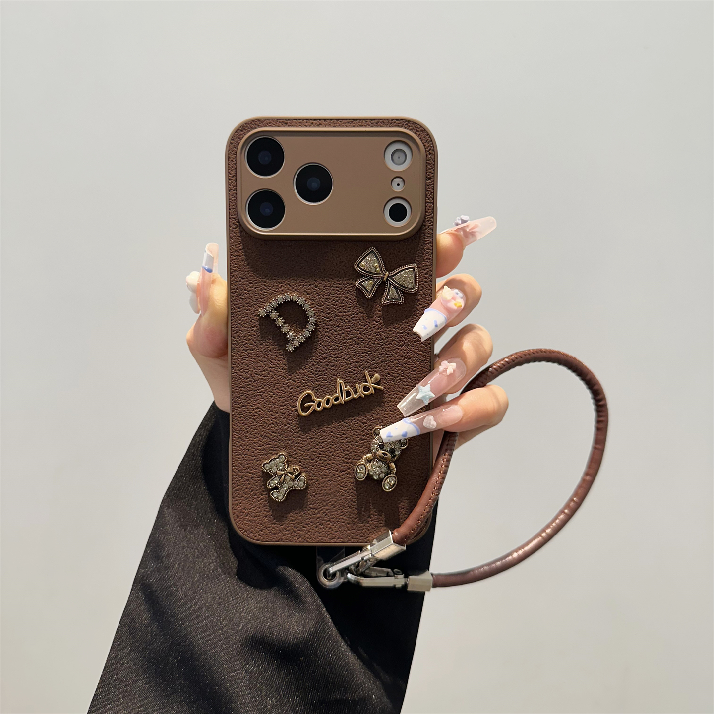 棕色月坑皮纹小熊手机壳