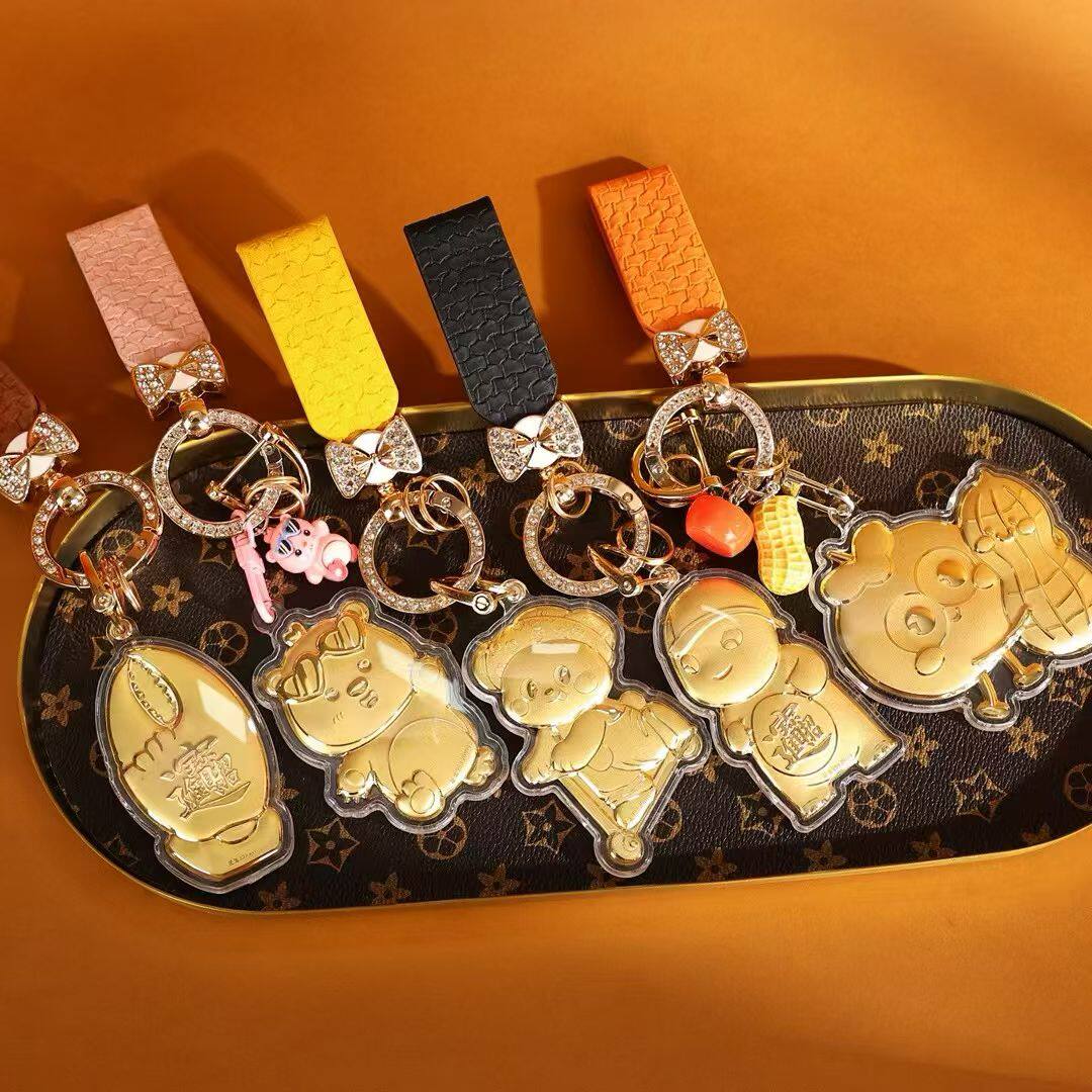 水贝低克重黄金爱心眼镜水豚噜噜手机链钥匙扣包挂件传统新年送礼