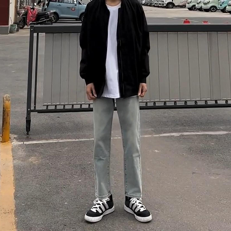 黄泥水洗做旧牛仔裤男