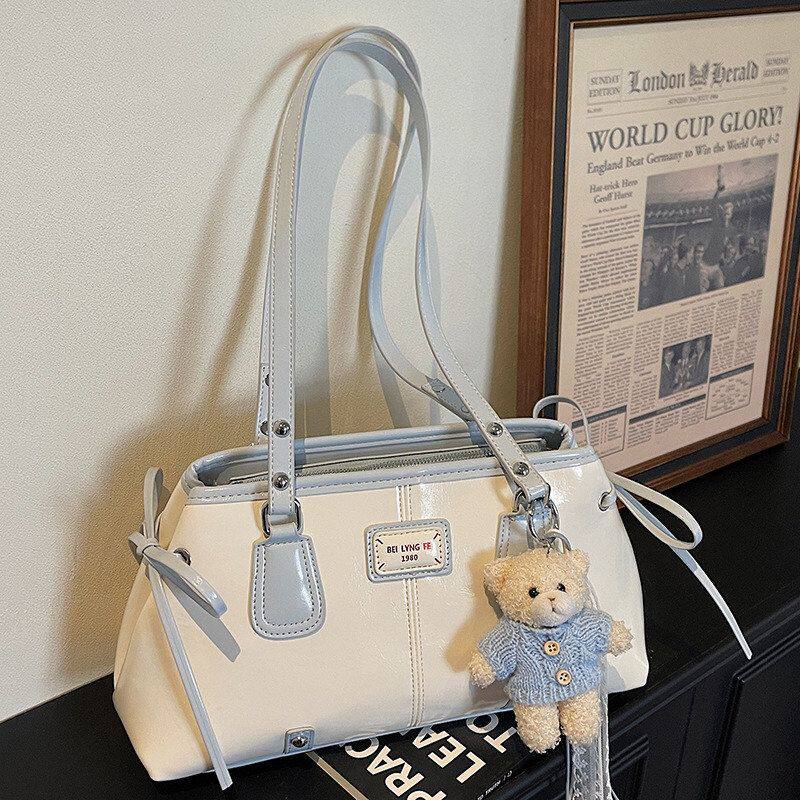 简约托特包女大容量手提单肩包2026春季新款休闲韩版女通勤法棍包