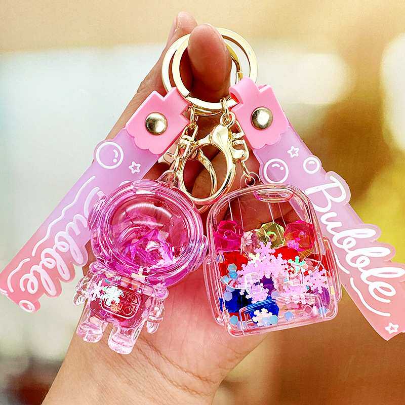 新品 卡通宇航员流沙瓶钥匙扣摆摊小礼品漂浮入油液体钥匙链