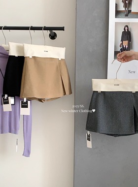 黑色复古毛呢半身裙女2025秋冬新款超好看设计感梨形遮胯a字短裙