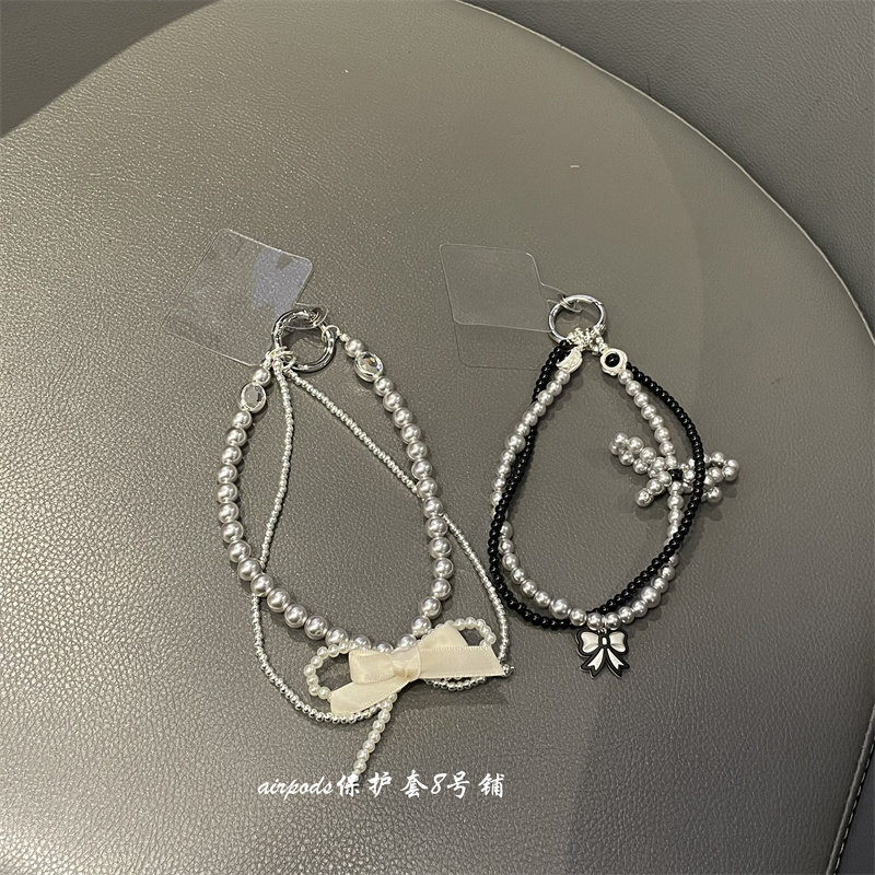 电镀银色蝴蝶结手机挂坠