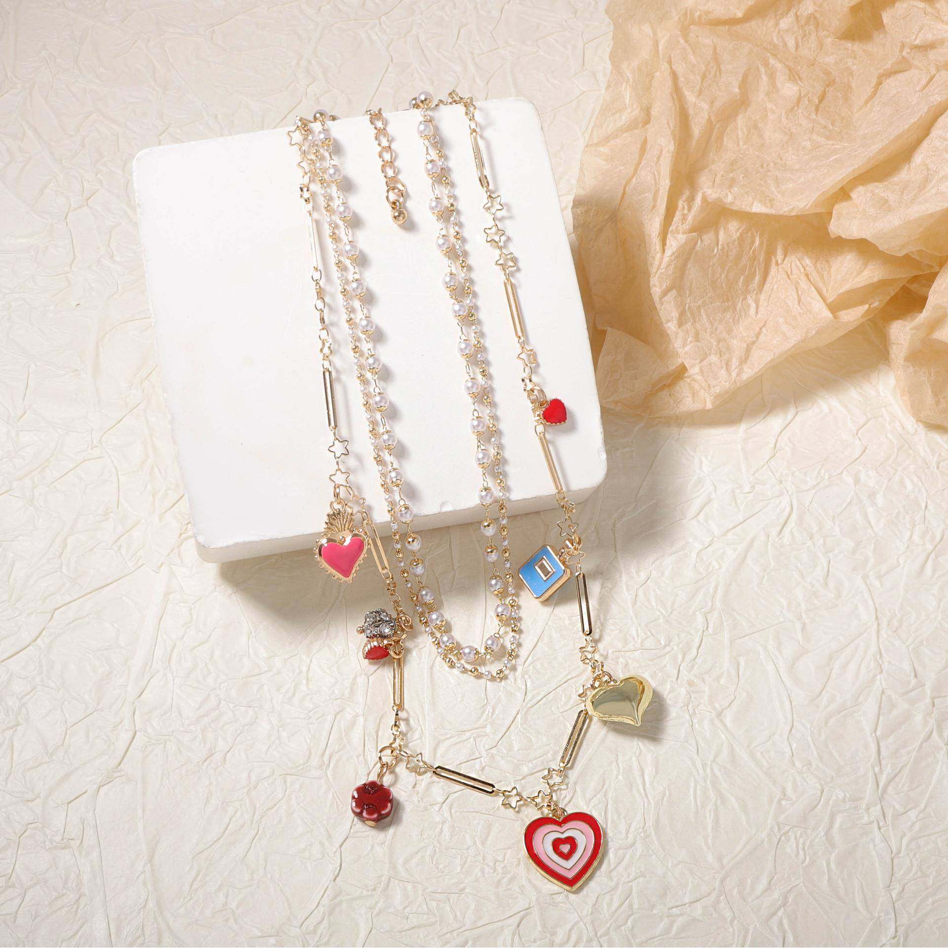 跨境韩版清新时尚仿珍珠三层链条叠戴项链滴油合金爱心吊坠小众女,饰品/流行首饰/时尚饰品新,项链,淘宝优惠券,粉丝福利购,淘宝优惠卷