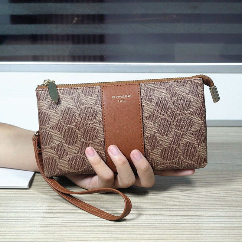 欧美时尚女士手拿包2026新款印花迷你手腕包装手机卡位手抓零钱包