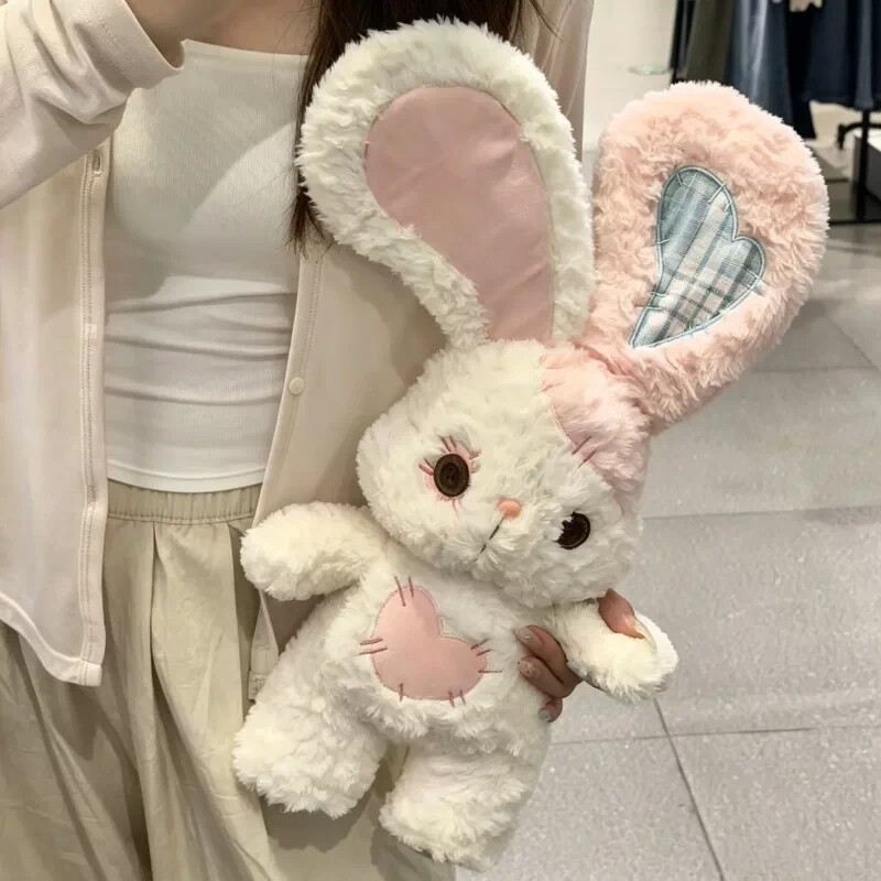 纽扣补丁兔子玩偶毛绒玩具图片
