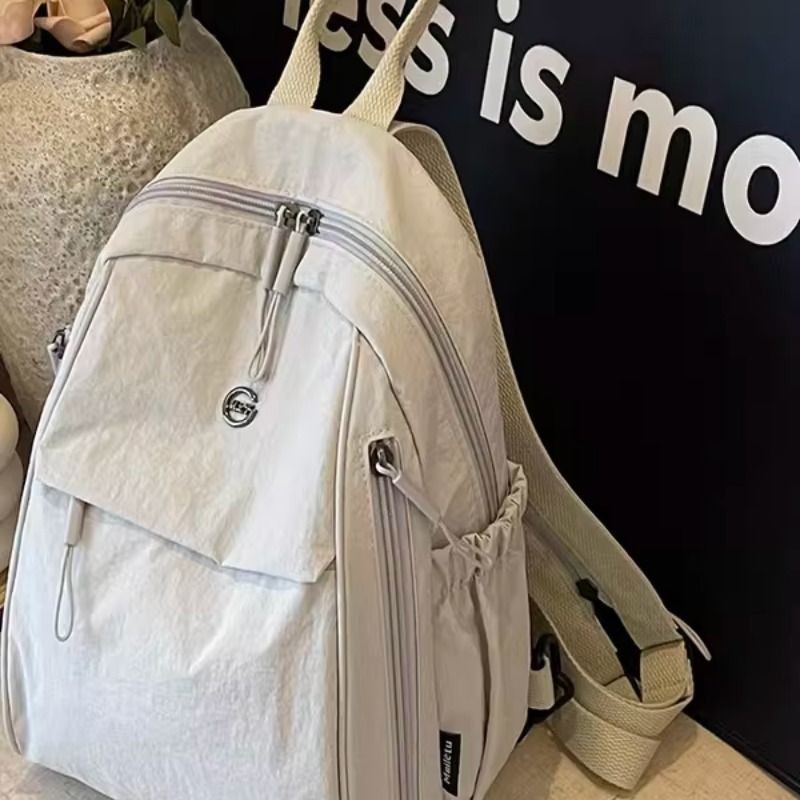 双肩包超轻2025新款高级感小众尼龙帆布上班通勤旅行背包小型轻便