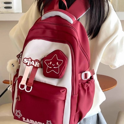 书包女生小学生三到六年级减负护脊超轻便大容量初中生双肩包新款