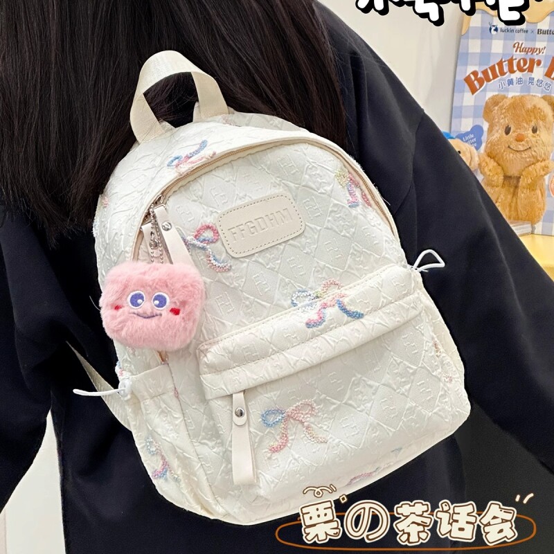茶话会日系高颜值书包女生百搭轻便通勤背包初中生高中学生双肩包