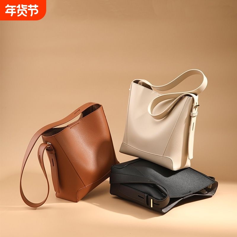 水桶包女包包2026新款高级大容量托特牛皮单肩通勤斜挎包女包,箱包皮具/热销女包/男包,水桶包,淘宝优惠券,粉丝福利购,淘宝优惠卷