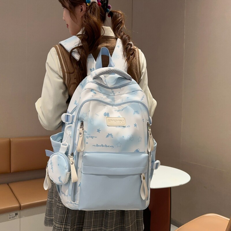 新款高颜值星星蝴蝶印花双肩包女学生书包大容量可爱百搭休闲背包