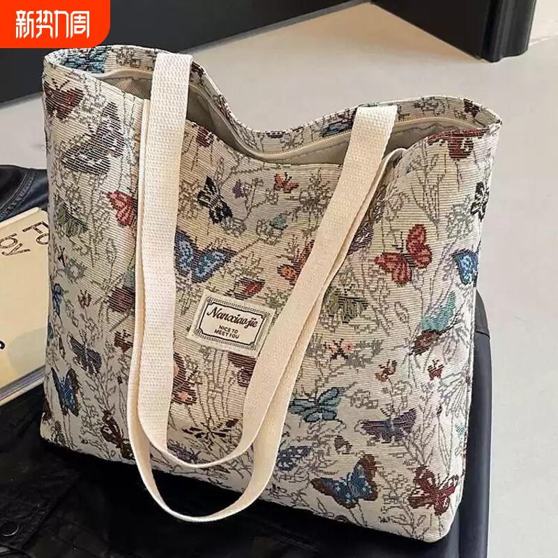 大容量帆布包包2025新款通勤托特包女ins外出单肩妈咪包手提斜