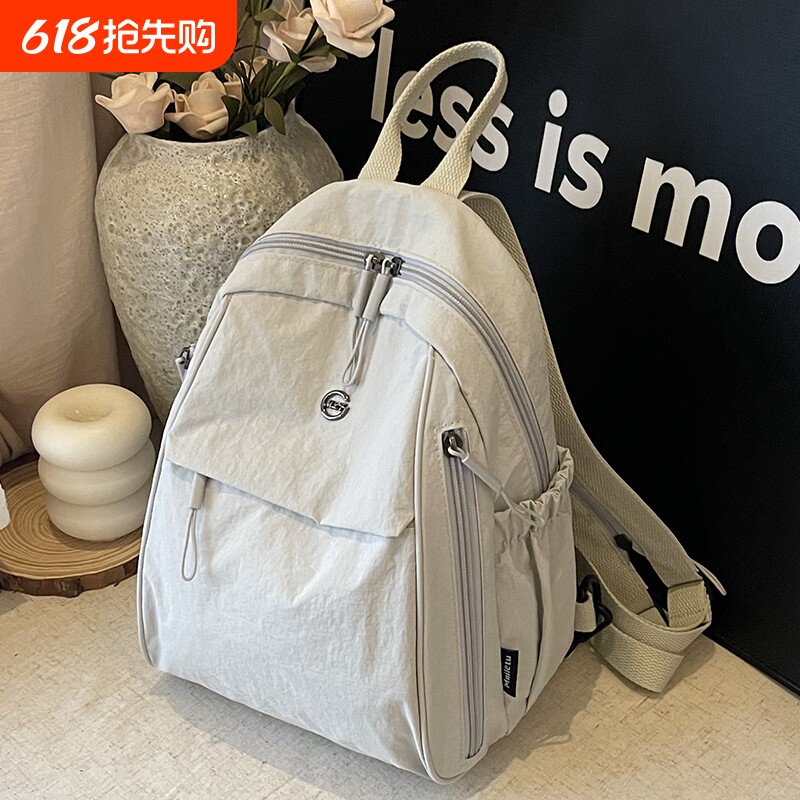 双肩包超轻2025新款高级感小众尼龙帆布上班通勤旅行背包小型轻便
