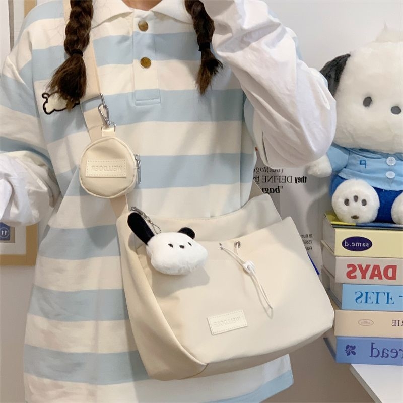 斜挎包女孩出游儿童小背包初中学生外出旅行包高中生轻便单肩书包
