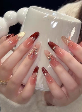 穿戴甲中长款新年新款轻奢红色法式猫眼显白手工高级感美甲贴烟花