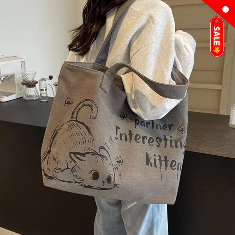 休闲大容量春季托特包包女2025新款帆布通勤单肩包外出手提购物袋