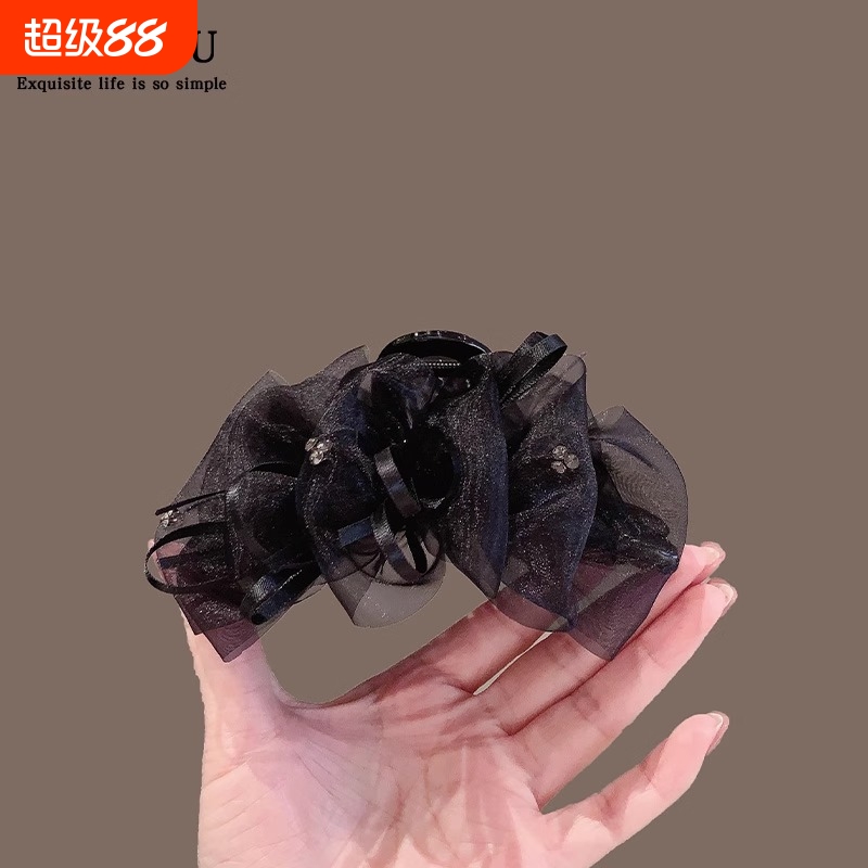抓夹女2025年发量少蝴蝶结新款网纱高级感后脑勺半扎发鲨鱼夹羽毛