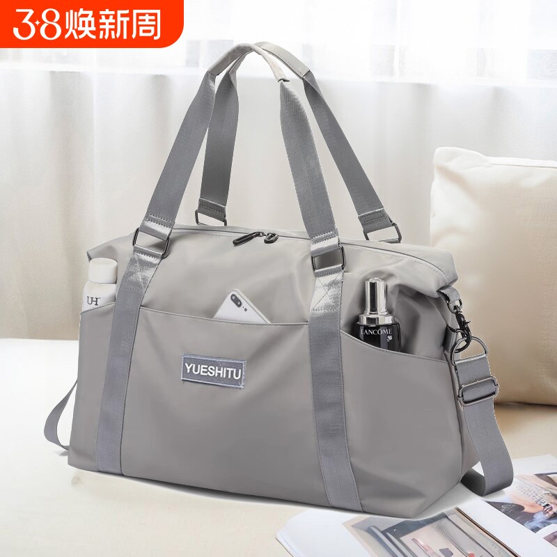 大容量手提短途旅行包女时尚轻便防水行李包男出差旅游收纳登机包