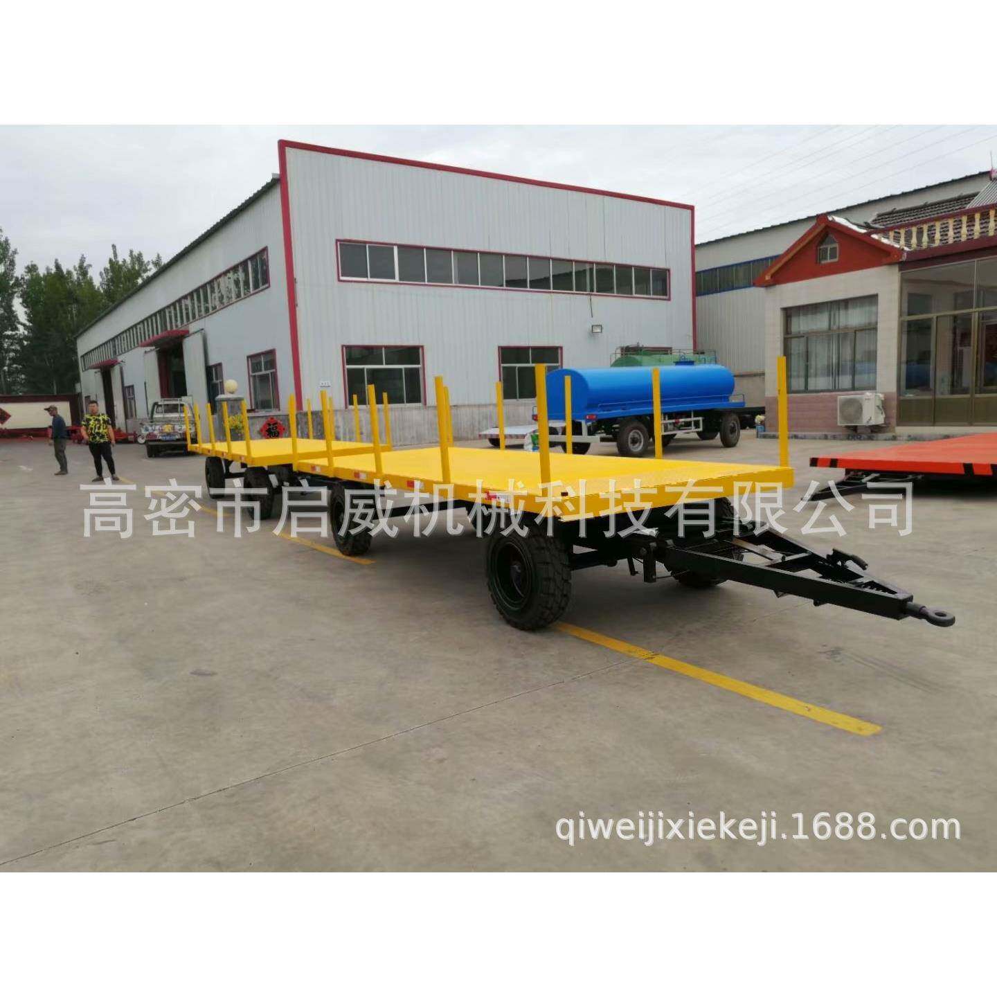 串联式围栏拖车实心胎牵引拖车配件叉车牵引平板拖车厂家