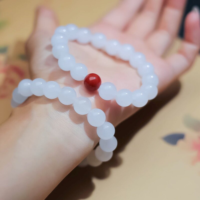 新疆天然金丝玉手串天鹅玉圆珠羊