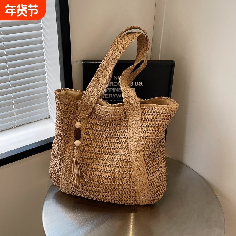 夏日慵懒风草编包女2025新款百搭大容量通勤托特包时尚洋气编织包