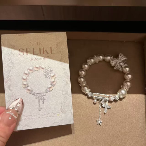 高级感白色蕾丝蝴蝶结手链女小众轻奢满钻别针扣十字架流星珠手串