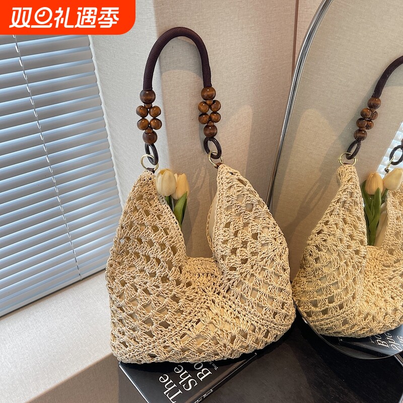 夏天草编包包女2025新款海边度假沙滩镂空单肩托特包编织菜篮子包