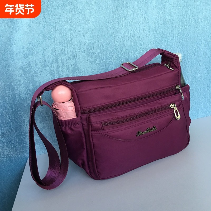 单肩斜挎包2025女包防水帆布大容量中老年包包妈妈包紫色蓝色百搭
