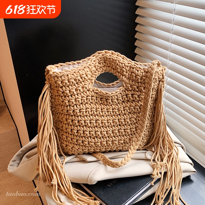 杺薇独特小众设计编织包包女式2025新款夏季斜挎包流苏手提水桶包