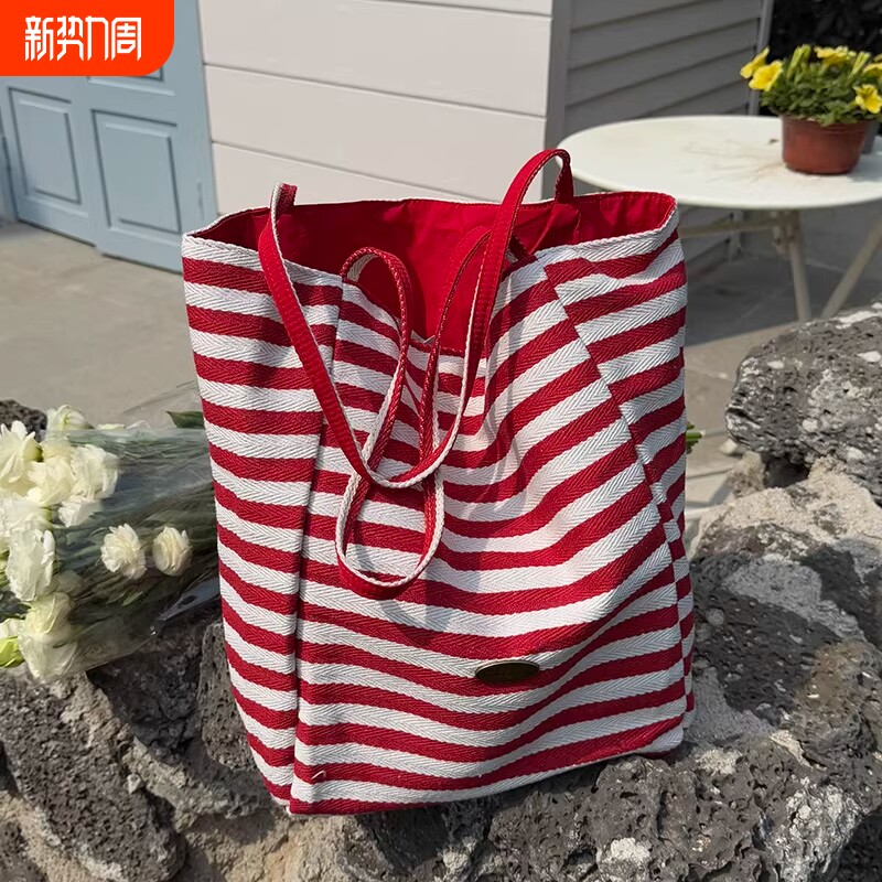 双面包帆布袋包包女式2025新款条纹韩托特包红色容量大单肩大容量