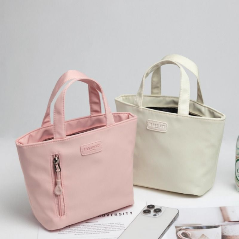 迷你手提小包原创纯色女包防泼水小布包时尚简约百搭手提包化妆包