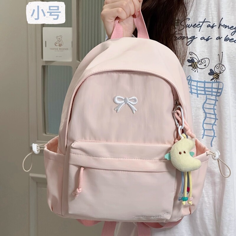 日系ins纯色简约小背包高颜值轻便中学生书包百搭双肩包蝴蝶结