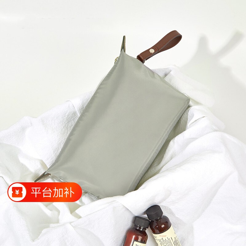 简约复合布化妆包收纳包旅行便携化妆品手提饺子包防水洗漱袋手拿