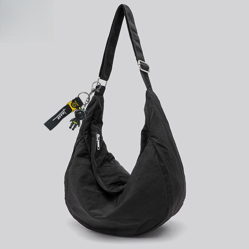伊布古奇新款男女休闲尼龙布大容量饺子包运动通勤单肩斜挎包黑色