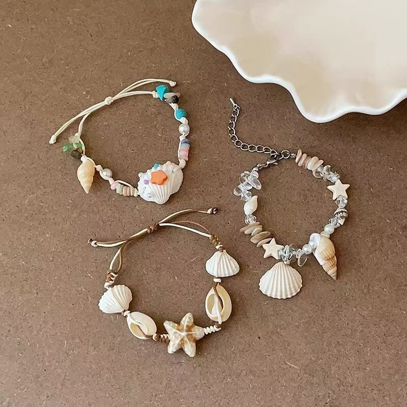 设计感海螺海星贝壳手链编织抽拉女可爱甜美气质时尚优雅手环手饰