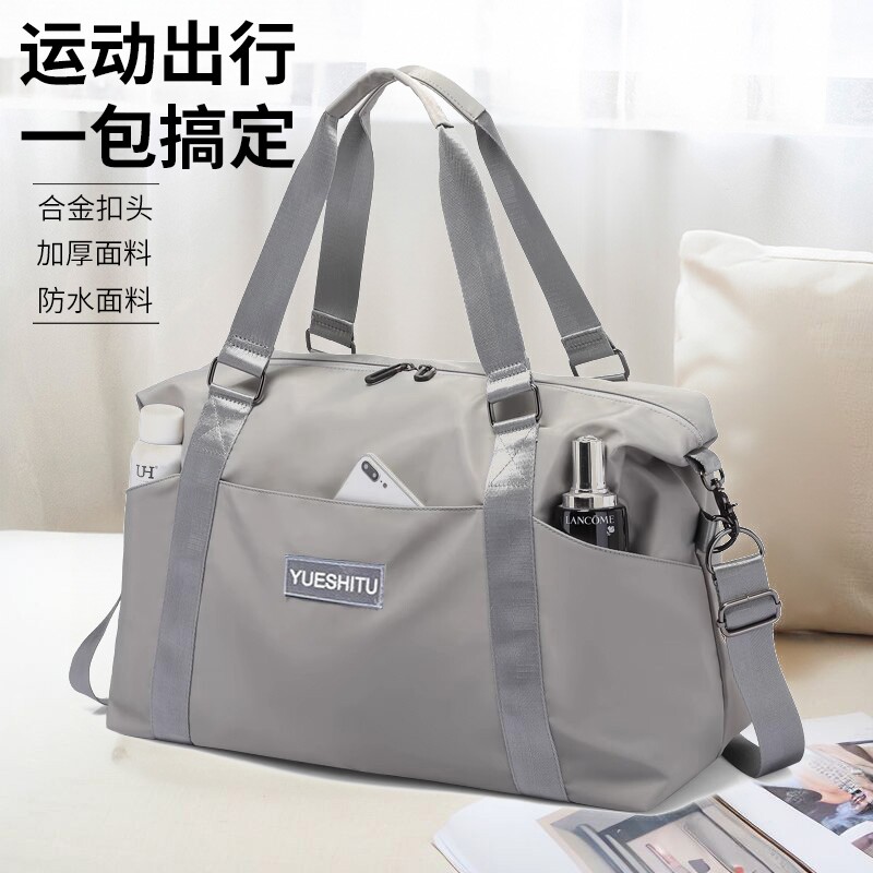 大容量手提短途旅行包女时尚轻便防水行李包男出差旅游收纳登机包