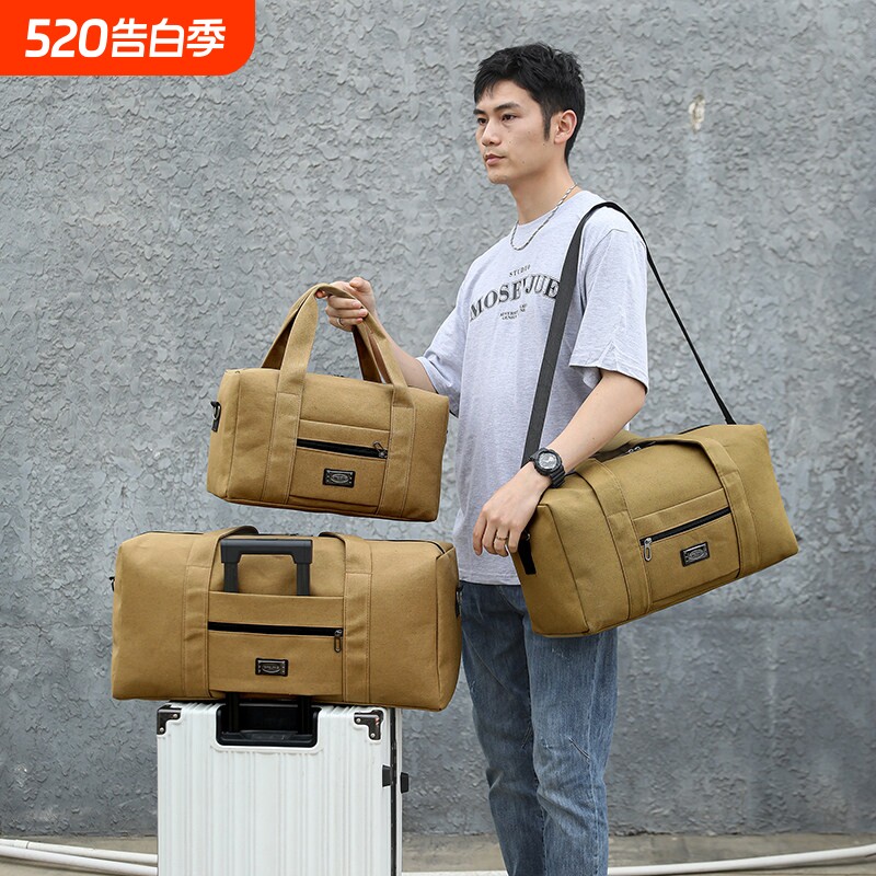 复古时尚大容量帆布旅行包女手提百搭行李包男短途打工出差旅游包