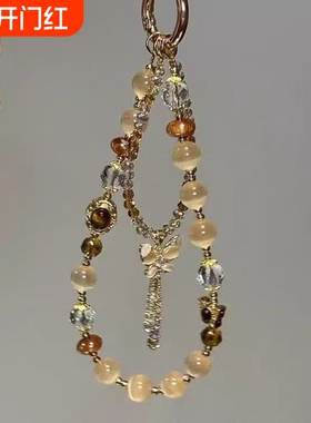 精致德虎眼色蝴蝶流苏手机链2025新款美拉百搭包挂件ccd相机发饰