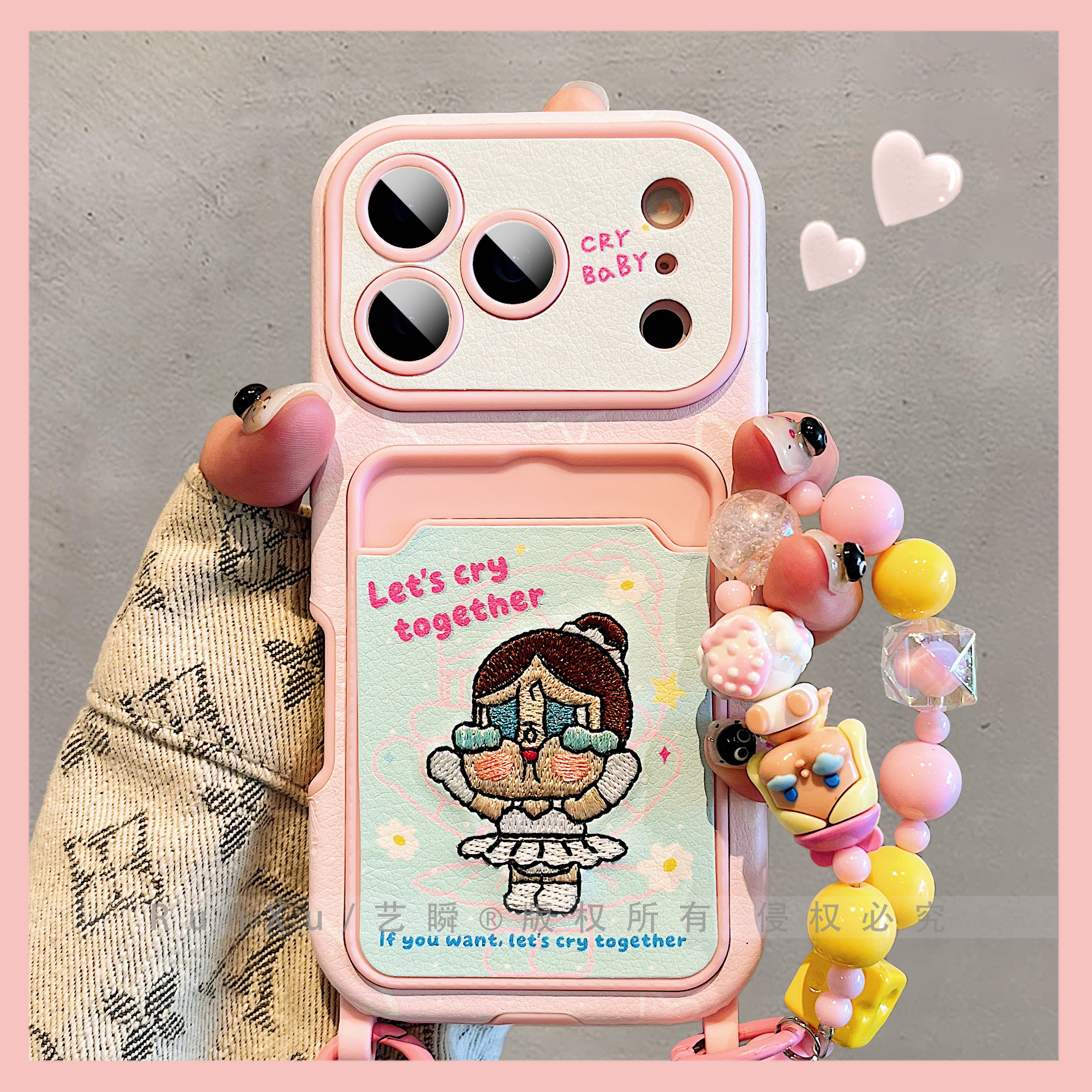 粉色皮质可爱刺绣哭娃适用iPhone17ProMax手机壳苹果16pro插卡包13全包镜头15pro带挂绳手链14防摔ip17保护套