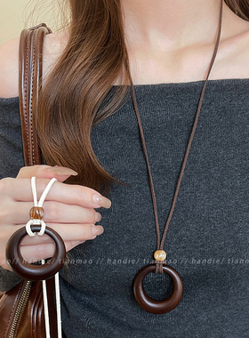 新中式圆环吊坠长款项链女款2025新款高端轻奢小众颈链毛衣链配饰