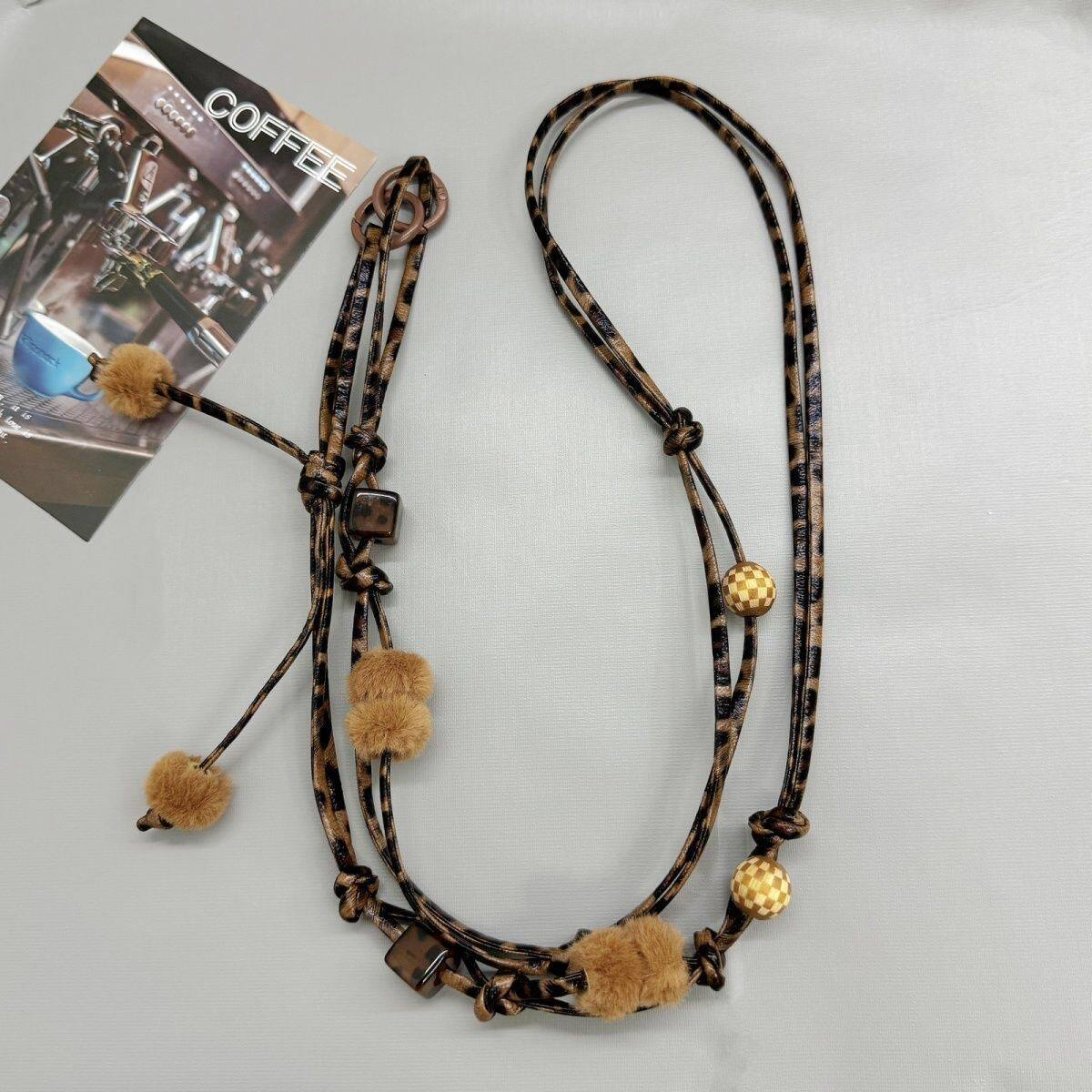 moumou studio搭配包包造型猫猫手机壳的豹纹手机绳挂件手机链