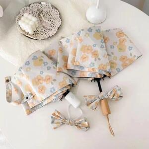 小黄花小巧黑胶太阳伞遮阳女晴雨伞紫外线两用防晒故事